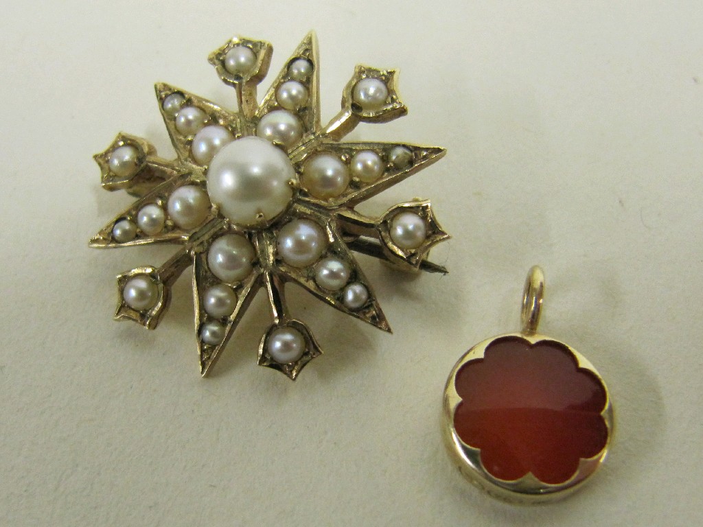 Appraisal: Edwardian seed pearl set star brooch and a ct gold