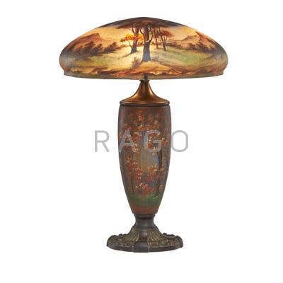 Appraisal: ART GLASS TABLE LAMP - socket reverse painted woodland scene