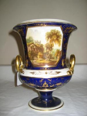 Appraisal: A DERBY PORCELAIN URN with flared rim gilded snake loop