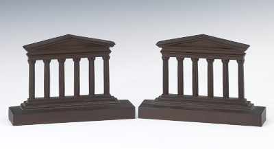 Appraisal: A Pair of Cast Metal Architectural Form Bookends Cast metal