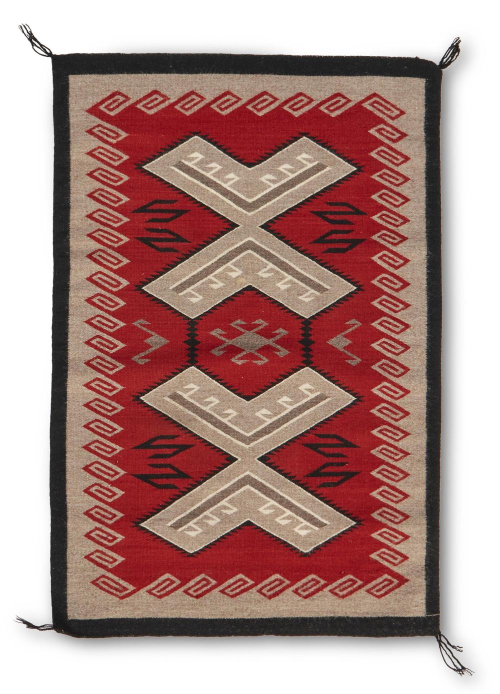 Appraisal: A Navajo regional saddle blanket Late th century Dine Woven