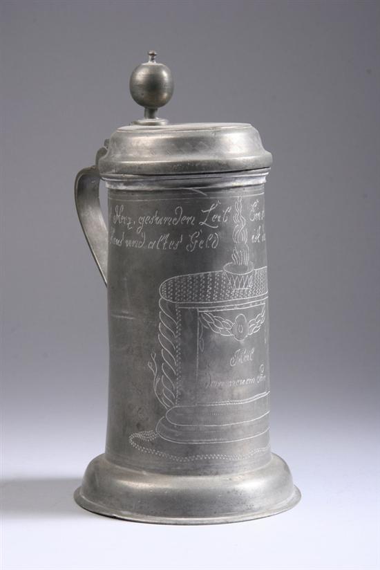 Appraisal: GERMAN PEWTER TANKARD early th century Wrigglework decoration and German