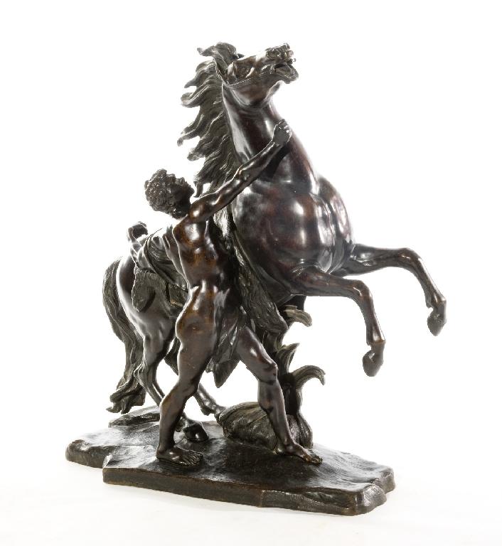 Appraisal: AFTER COUSTOU LARGE PATINATED BRONZE MODEL OF A MARLY HORSE