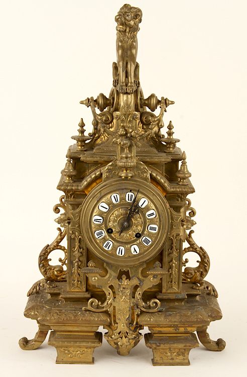 Appraisal: LATE TH C BRASS MANTLE CLOCK WITH LION FIGURE A