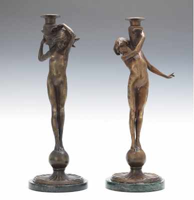 Appraisal: A Pair of Cast Bronze Candlesticks After E F McCartan