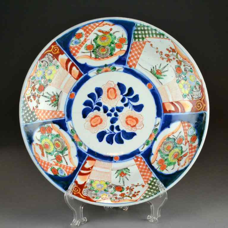 Appraisal: A Large Japanese Imari Porcelain ChargerFinely painted in panels depicting