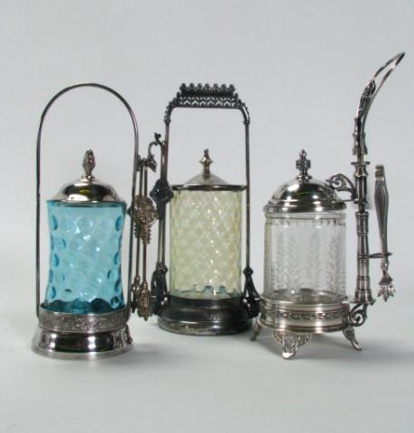 Appraisal: Three pickle caster sets including antique Meriden B Company quadruple