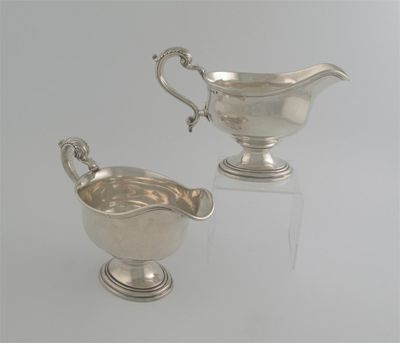 Appraisal: A pair of George II oval sauceboats with moulded rims