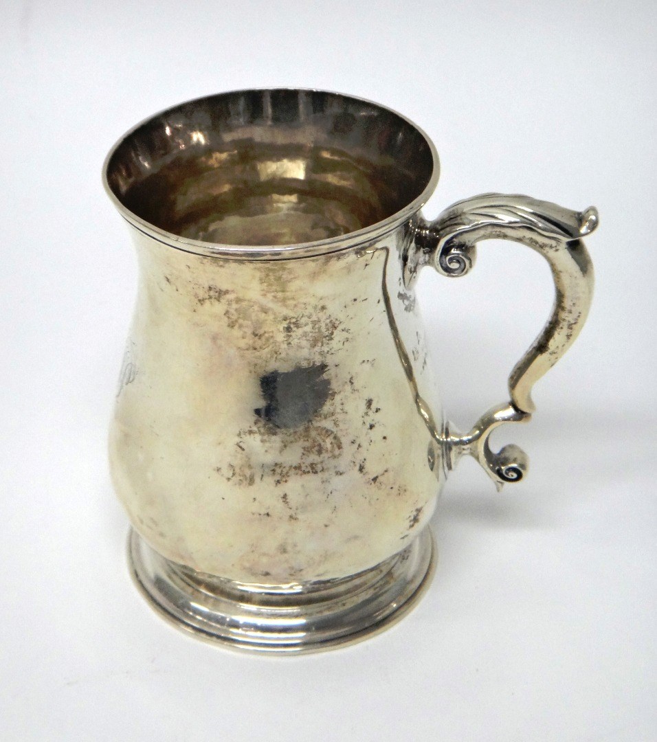 Appraisal: A George II silver mug of baluster form the plain