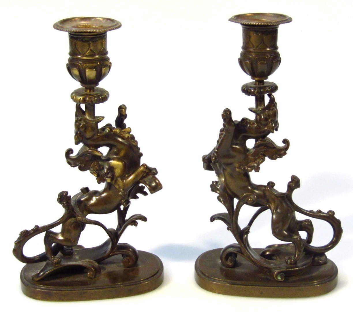 Appraisal: A pair of thC bronzed style candlesticks each with classical