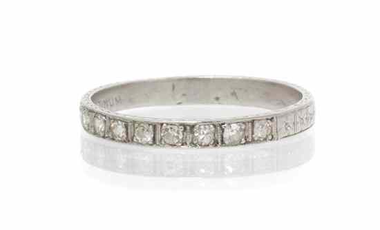 Appraisal: A Platinum and Diamond Band containing nine round single cut