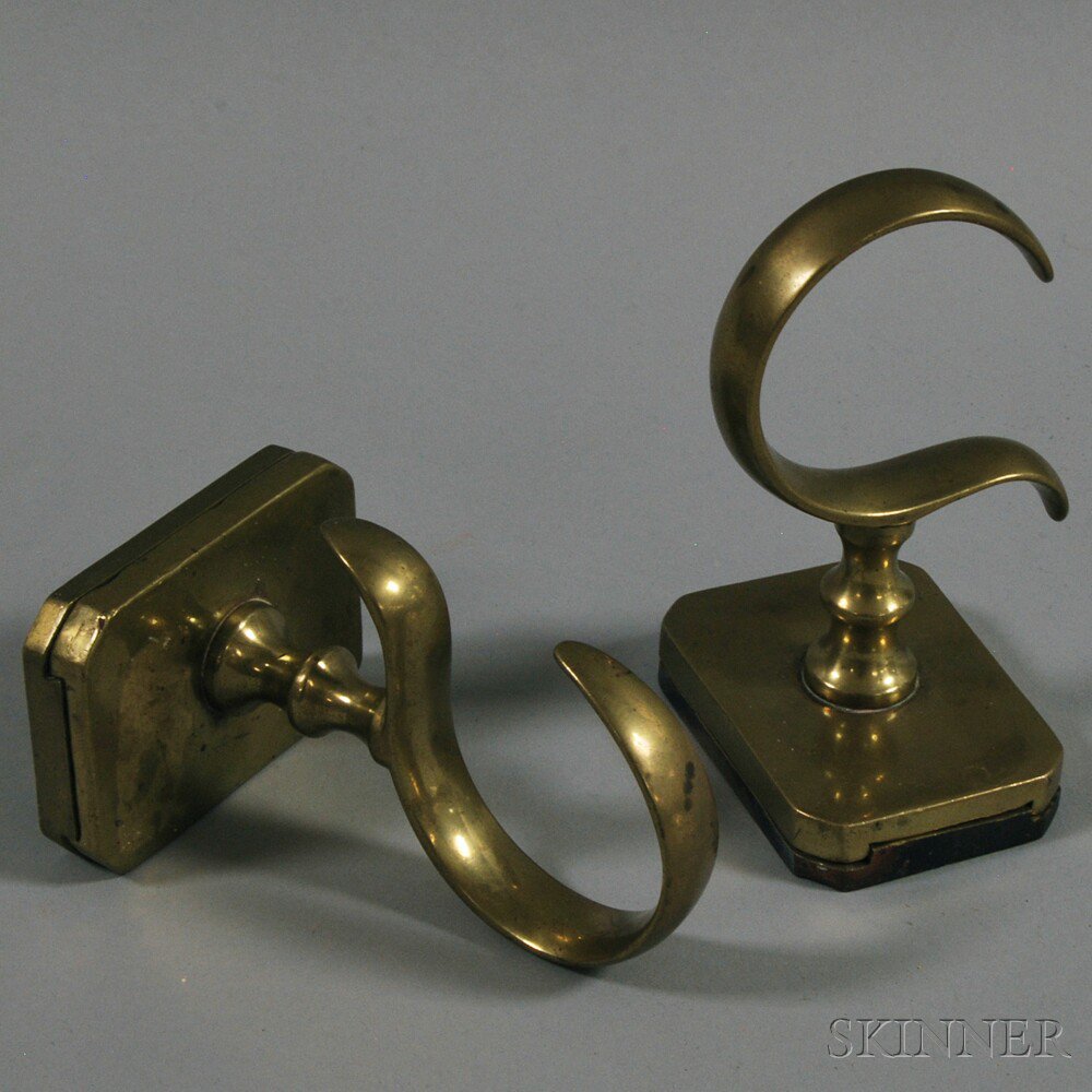 Appraisal: Pair of Brass Jamb Hooks America early th century with