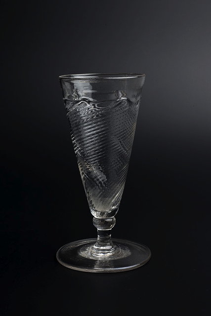 Appraisal: AN TH CENTURY ALE GLASS with finely wrythen tapering body