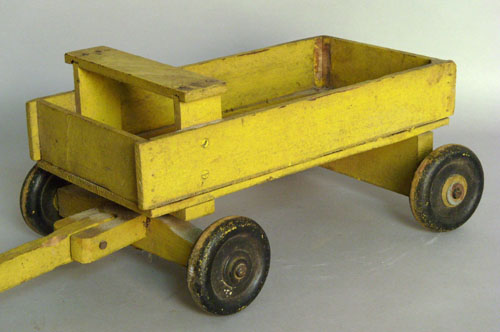 Appraisal: Yellow painted toy pull cart l