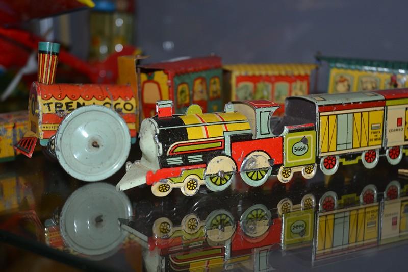 Appraisal: TWO MARAZZO TIN PLATE CLOCKWORK LOCOMOTIVES AND ONE OTHER