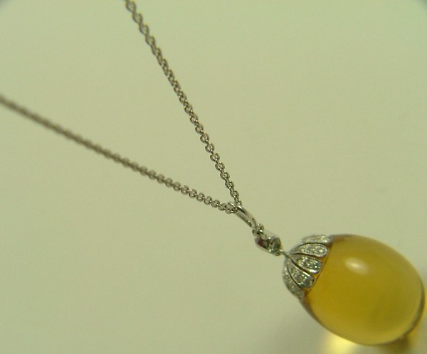 Appraisal: CITRINE AND DIAMOND PENDANT NECKLACE the K white gold pendant