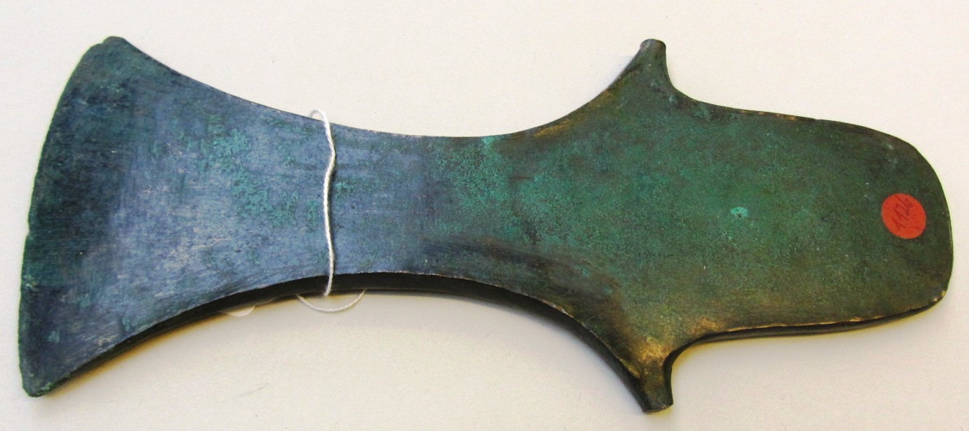 Appraisal: A large Ancient Near Eastern bronze axe head of flattened