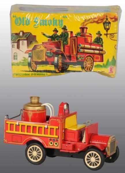 Appraisal: Lot of Tin Fire Engine Toys Description Japanese Working Includes