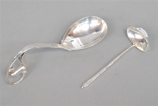 Appraisal: TWO GEORG JENSEN STERLING SILVER SMALL LADLES One large oval