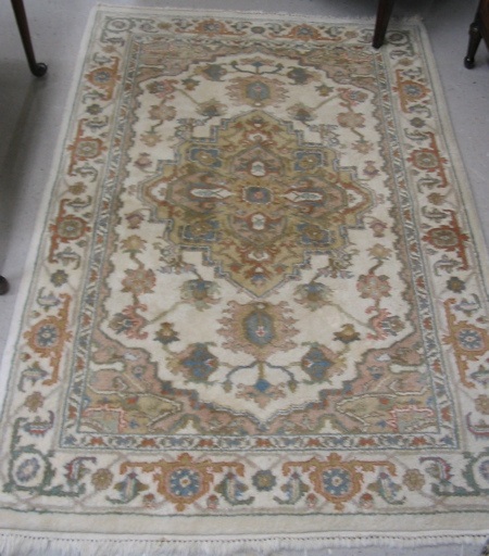 Appraisal: TWO MATCHING ORIENTAL AREA RUGS Indo-Persian medallion and overall stylize