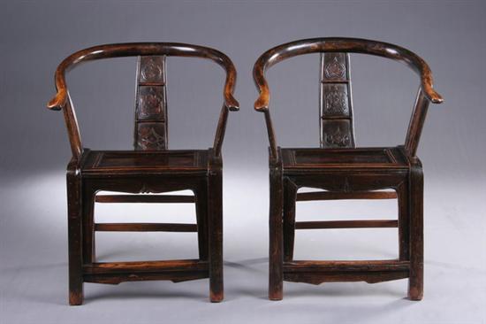 Appraisal: PAIR CHINESE LACQUERED ELMWOOD HORSESHOE BACK ARMCHAIRS Shanxi province th