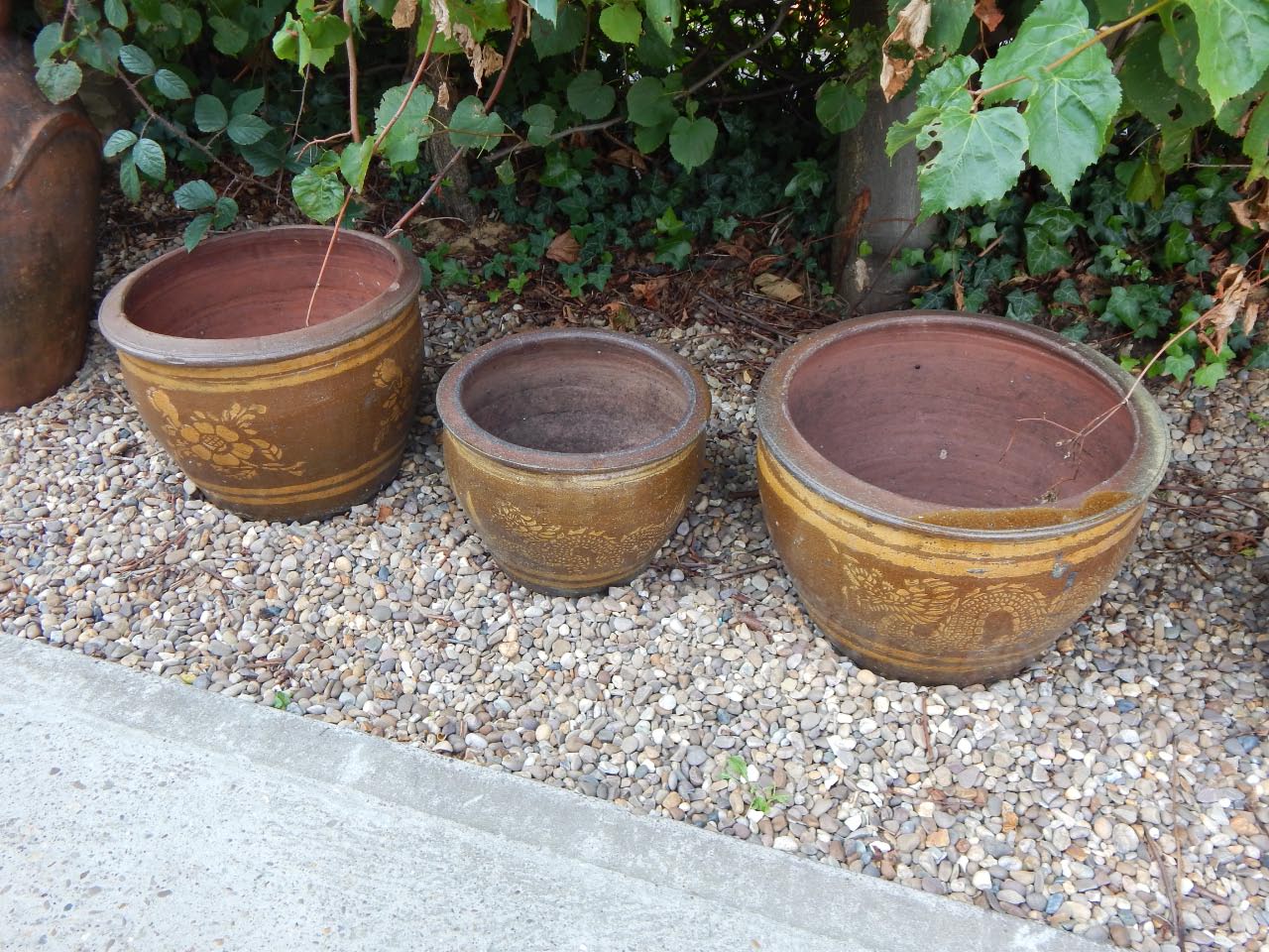 Appraisal: Three Chinese stoneware jardinieres each decorated with dragons flowers etc