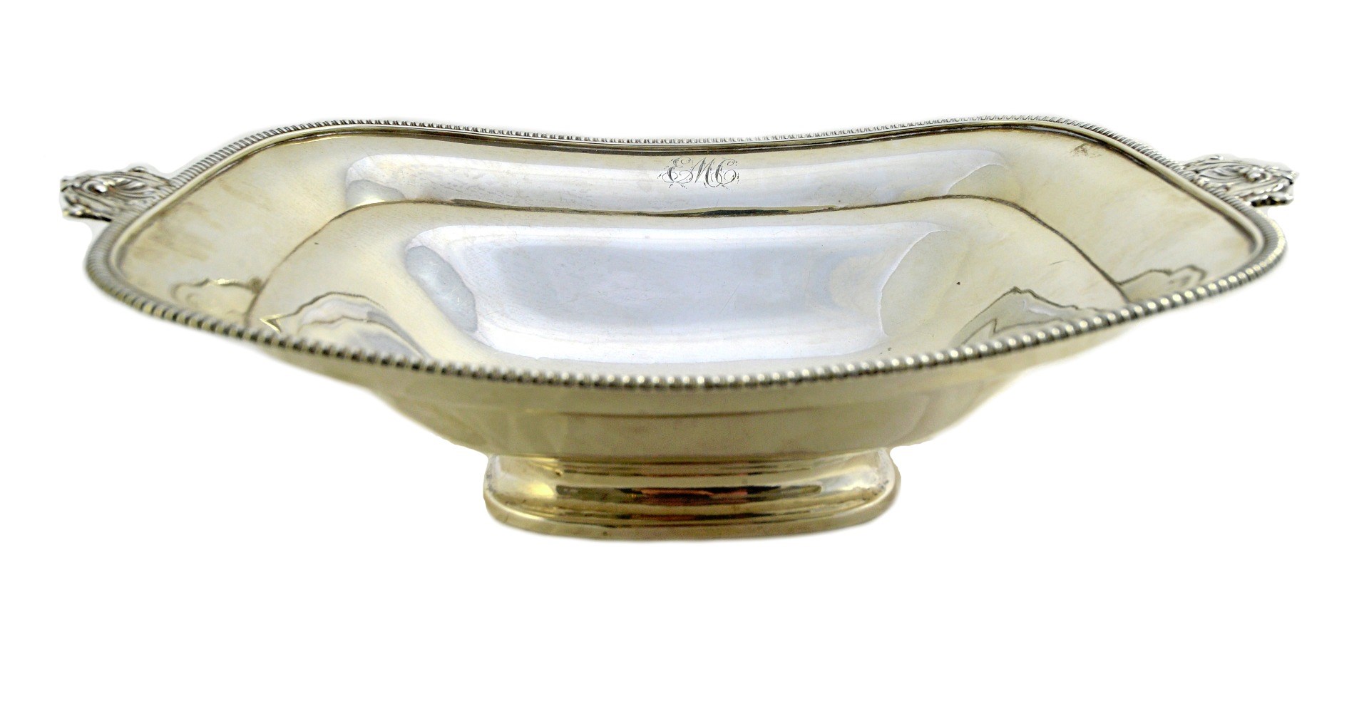 Appraisal: A George III silver twin handled bread basket of curved