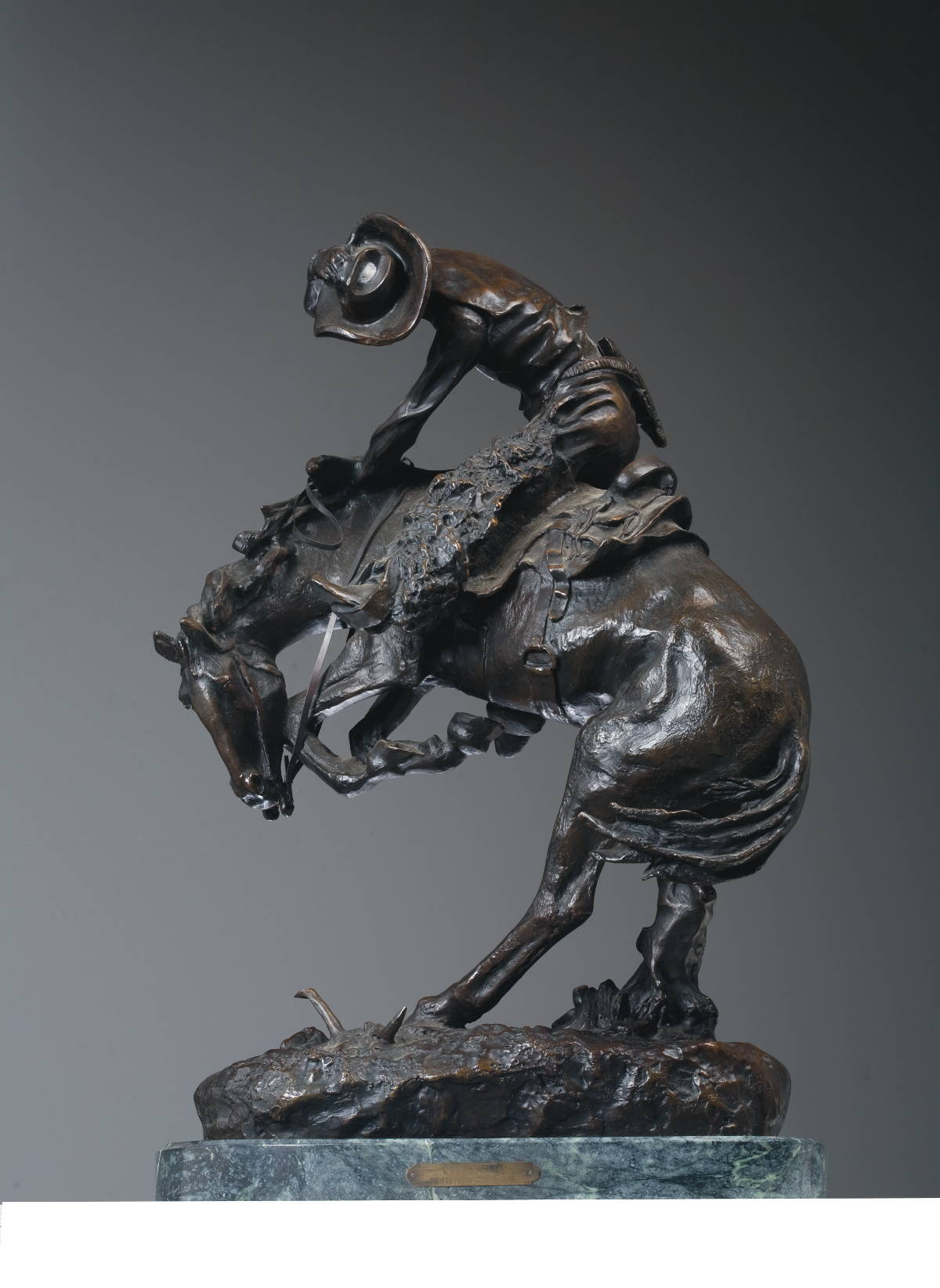 Appraisal: BRONZE FIGURE OF quot THE RATTLESNAKE quot AFTER FREDERIC REMINGTON