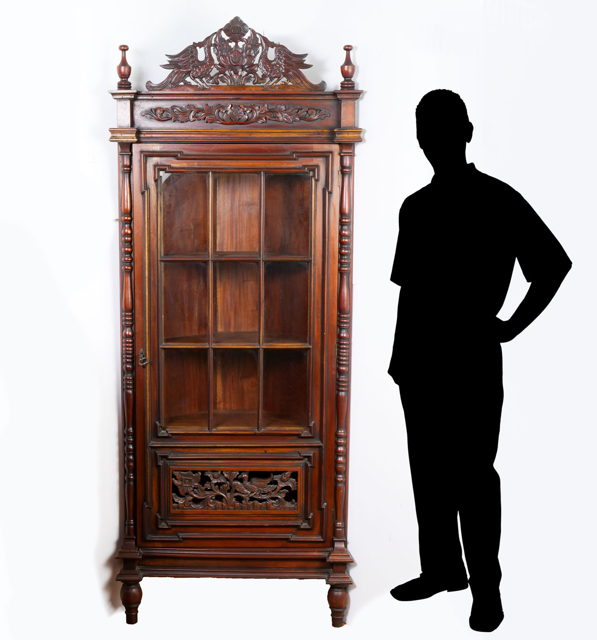 Appraisal: CARVED MAHOGANY CORNER CABINET Pierced floral Phoenix crest flanked by