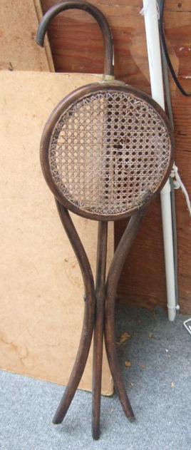 Appraisal: A beech bentwood and canework shooting stick seat a hickory