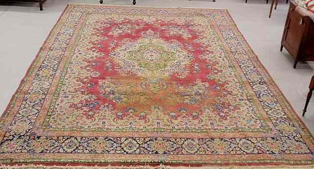 Appraisal: Kerman oriental carpet with floral patterns As found 'x '