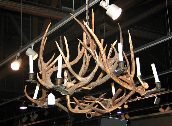 Appraisal: An antler and painted metal eight light chandelier approximate height