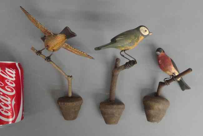 Appraisal: Lot painted folk art carved wall birds '' to ''