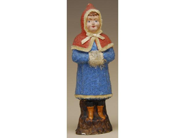 Appraisal: Snow Child Candy Container Germany ca painted and molded composition