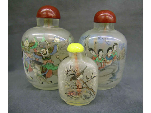 Appraisal: Three antique oriental snuff bottles all are paint-decorated case glass