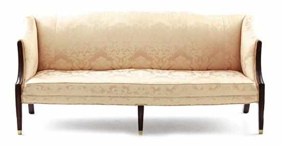 Appraisal: Sheraton carved mahogany sofa circa shaped crest flanked by downswept