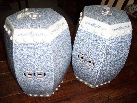 Appraisal: A pair of hexagonal garden seats decorated all over in