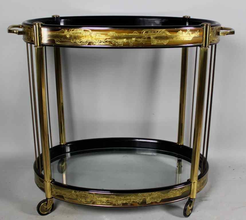 Appraisal: CONTEMPORARY OVAL BLACK ETCHED BRASS TWO-TIER BAR CART-ON-CASTERS The cart