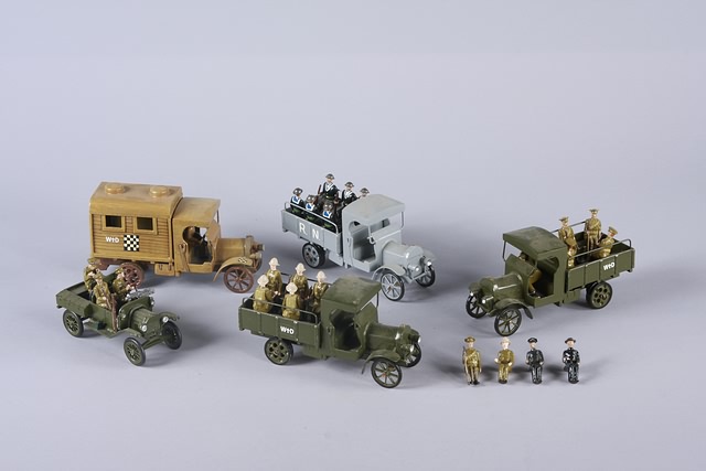 Appraisal: Lot of WWI metal vehicles together with metal figures by