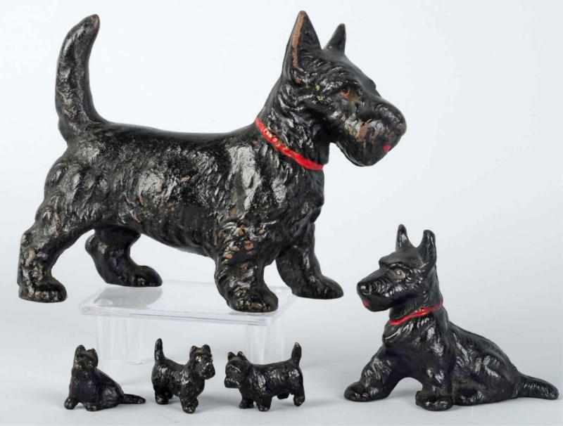 Appraisal: Lot of Cast Iron Scottie Pieces Includes Sitting Scottie paperweight