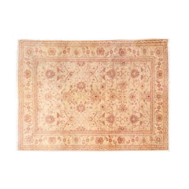 Appraisal: PAK OUSHAK RUG Beige field with pink floral and palmette