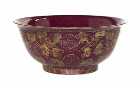 Appraisal: A Chinese Red-Glazed Center Bowl having gilt decoration of bats