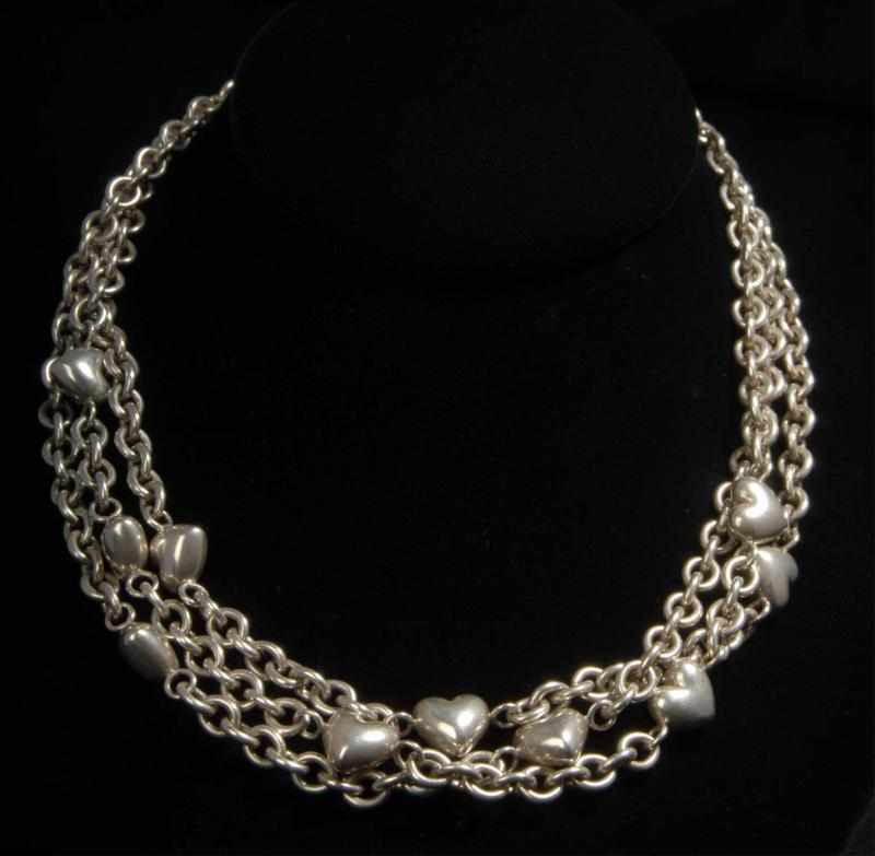 Appraisal: Tiffany Sterling Silver Triple Strand Necklace Description With hearts Weight