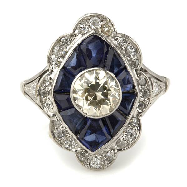 Appraisal: An art deco diamond and sapphire ring centering an old