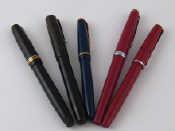 Appraisal: Four fountain pens and an ink pencil unrestored used condition