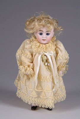 Appraisal: - ALL-BISQUE GIRL DOLL Marked on the rear of the