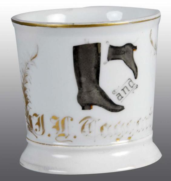 Appraisal: Occupational Shaving Barber Mug of Boot Shoe Description Polychrome paint