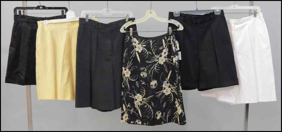 Appraisal: TWO PAIRS OF YVES SAINT LAURENT SHORTS Together with three