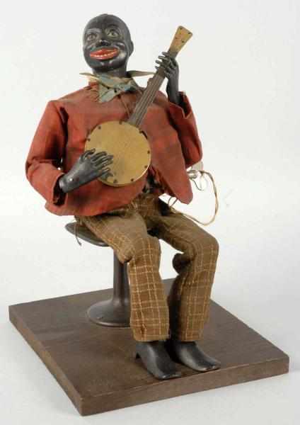 Appraisal: Jerome Secor Banjo Player Clockwork Toy Description Manufactured in s