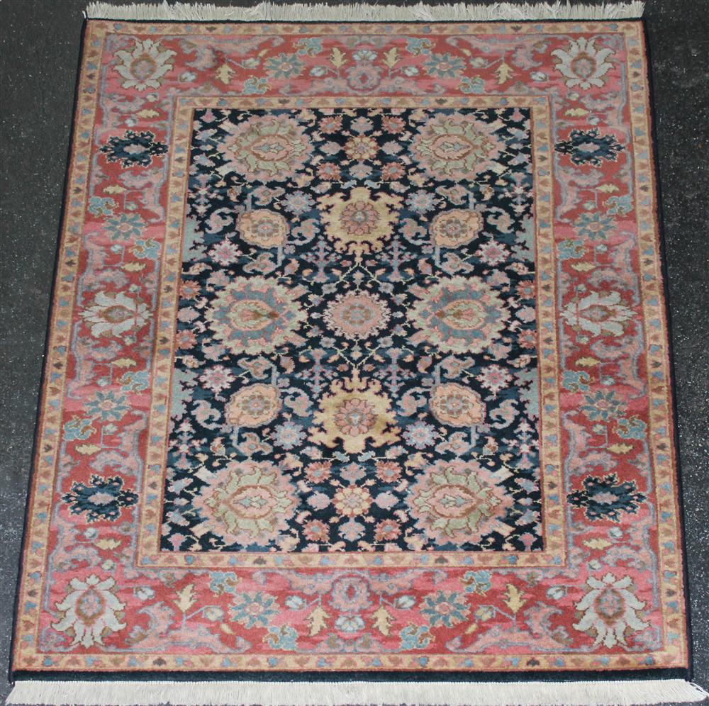 Appraisal: KARASTAN WILLIAMSBURG KURDISH DESIGN WOOL RUG having rose blues sage